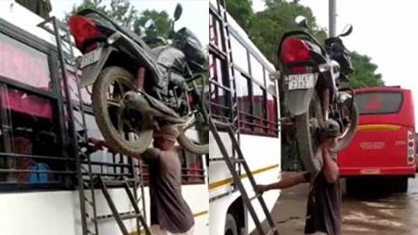 'ഇതാണ് ശരിക്കും ബാഹുബലി': ബൈക്ക് തലയിലേന്തി ഒറ്റയ്ക്ക് ബസിന് മുകളിലേക്ക്, വൈറല്‍ വീഡിയോ