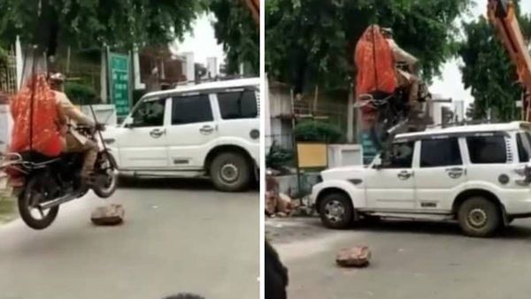 Viral Video: കാറിന് മുകളിലൂടെ ചീറിപ്പായുന്ന ബൈക്കില്‍ വരനും വധുവും, സിനിമാ സ്റ്റൈല്‍; പിന്നാമ്പുറ കാഴ്ചയോ!