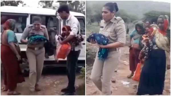 ദുരന്തമുഖത്തെ കരുതല്‍ സ്പർശം: 4 ദിവസം പ്രായമുള്ള കുഞ്ഞിനേയുമേന്തി പൊലീസുകാരി, വൈറല്‍ ദൃശ്യങ്ങള്‍