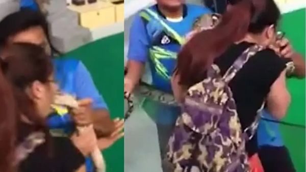 പാമ്പിന്റെ തലയിൽ ഉമ്മ വെച്ച്  യുവതി... മുഖത്ത് തന്നെ കൊത്ത് കൊണ്ടു..വൈറൽ ആയി വീഡിയോ