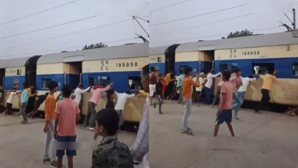 ട്രെയിനിന് തീപ്പിടിച്ചു, പടരാതിരിക്കാന്‍ ബോഗികള്‍ തള്ളിമാറ്റി നാട്ടുകാര്‍? വീഡിയോ വൈറല്‍