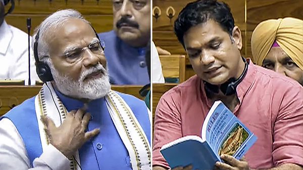 സഭയില്‍ നാടകീയരംഗങ്ങള്‍; അടുത്തുനിന്ന് മുദ്രാവാക്യം വിളിച്ച ഹൈബിക്ക് വെള്ളം കൊടുത്ത് മോദി, വാങ്ങി ഹൈബിയും