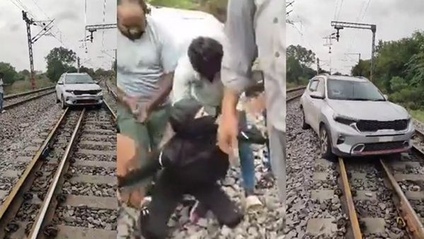 റെയില്‍വെ ട്രാക്കിലൂടെ കാര്‍ ഓടിച്ച് യുവതി; പിന്നാലെ പാഞ്ഞ് നാട്ടുകാര്‍, ട്രെയിനുകള്‍ വൈകി