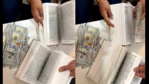 ଚୋରି କରିବାର ନୂଆ ଫର୍ମୁଲା, ବହି ଭିତରୁ ବାହାରିଲା ୯୦ ହଜାର ଡଲାର