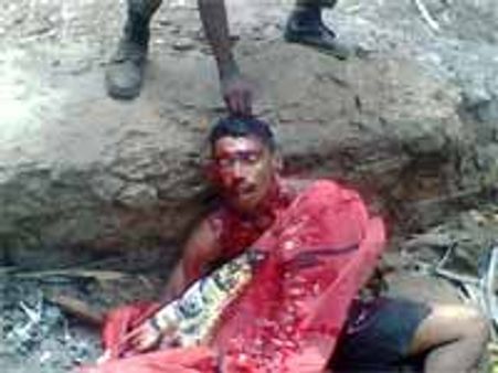 விடுதலைப் புலிகள் இயக்க போராளி கொடூரக் கொலை - படத்தால் பரபரப்பு