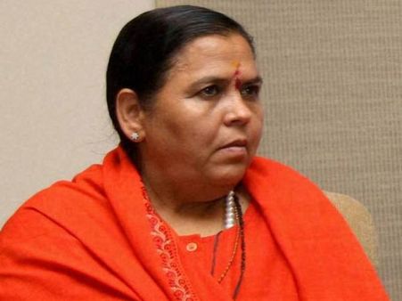 முதலில் வாக்குறுதிகளை நிறைவேற்றுங்கள்: ஆம் ஆத்மிக்கு உமா பாரதி அட்வைஸ்