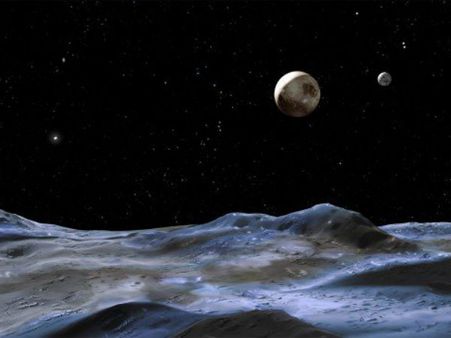 புளூட்டோவுக்கு பின்னாடி ஏதோ இருக்குது – நாசா கண்டுபிடிப்பு