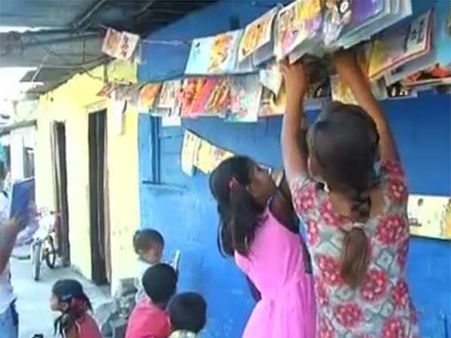 குடிசைப் பகுதி குழந்தைகளுக்காக... 9 வயது குழந்தை நடத்தும் “லைப்ரரி”- போபாலில்!