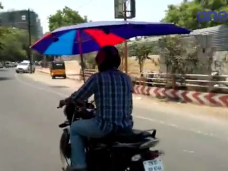 கோவையில் வாகன ஓட்டிகளை வெயிலில் இருந்து காப்பாற்றும் “வாகனக் குடை”!