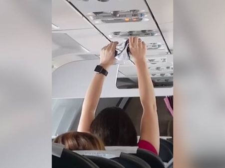 ஹாயாக விமான ஏசி வெண்ட்-டில் உள்ளாடையைக் காய வைக்கும் பெண்... வைரலாகும் வீடியோ!