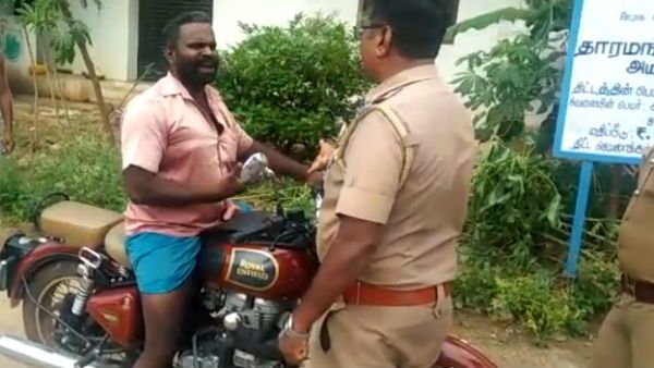 நான்தான் லோக்கல்னு சொல்றேன்ல.. ஹெல்மெட் போடாததுதான் இப்ப பிரச்சினையா.. போலீஸாருடன் வாக்குவாதம்!
