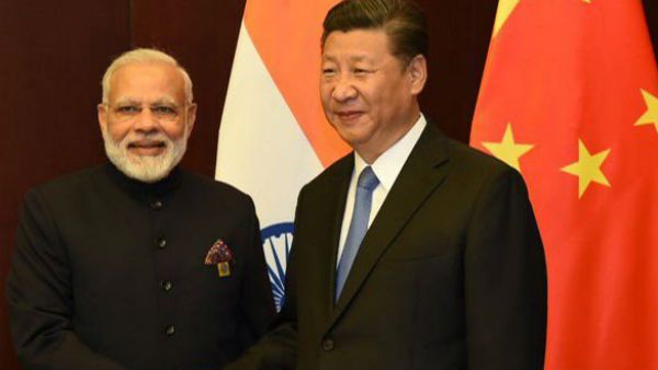 3 காரணங்கள்.. 2 வல்லரசுகள்.. சிவப்பு கொடிக்கு சிவப்பு கம்பளம் விரிக்கும் காவி கொடி.. என்ன காரணம்?