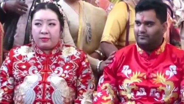 உயிர் கொல்லி கொரோனா வைரஸுக்கு மத்தியில் மலர்ந்த காதல்.. சீன பெண்ணை கரம் பிடித்த இந்திய இளைஞர்