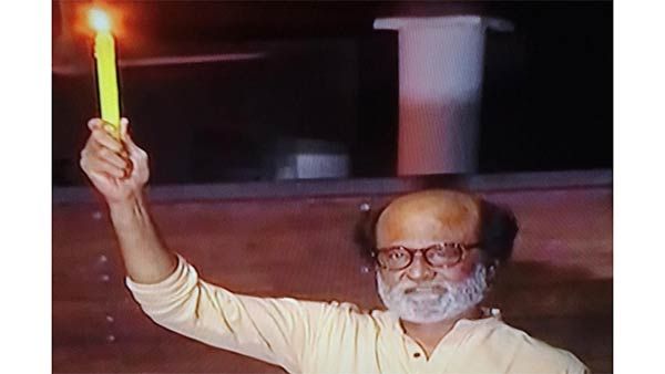 ஒலிம்பிக் தீபம் போல.. தலைக்கு மேல் மெழுகுவர்த்தியை ஏந்தியபடி வீட்டுக்கு வெளியே வந்த ரஜினிகாந்த்