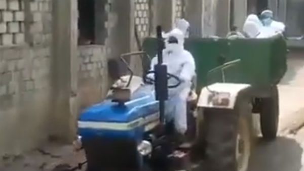 ஓட்டம் பிடித்த நகராட்சி ஊழியர்கள்.. டிராக்டரை ஓட்டி கொரோனா நோயாளியின் சடலத்தை அடக்கம் செய்த டாக்டர்