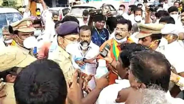 ஃபேன் இல்லை.. வசதி இல்லை.. எஸ்.பி. சட்டையை பிடித்து தள்ளி விட்ட பாஜகவினர்.. திருத்தணியில் ஷாக்!