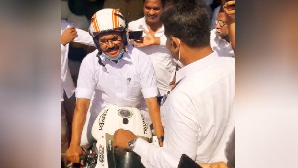 பைக்கில் வந்து ஸ்பென்சர் சிக்னலில் கெத்து காட்டிய அமைச்சர் ஜெயக்குமார்...செல்பி எடுத்த மக்கள்