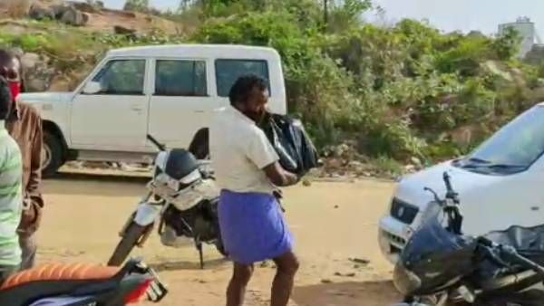 லாக்டவுன் நீட்டிப்பு: கர்நாடகா மதுபான கடைகளில் காலையிலேயே சாக்கு பைகளுடன் குவிந்த தமிழக குடிமகன்கள்