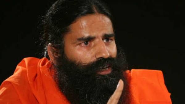 தடுப்பூசிக்கு எதிராக பிரசாரம்- ராம்தேவ் மீது தேசதுரோக வழக்கு கோரும் இந்திய மருத்துவ சங்கம்