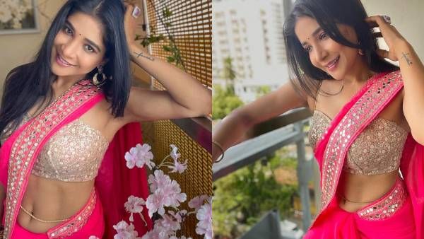 புடவையை ஒதுக்கி.. எல்லாமே ஹாட்தான்.. சாக்ஷியின் ஃப்ரீ ஷோ!