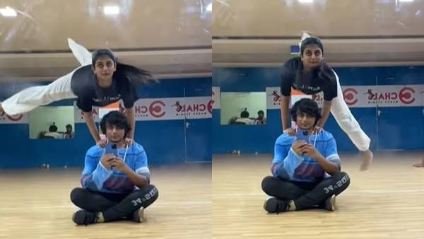 ஆஜீத்தின் தோளில் கையை ஊன்றி... தலைக்கு மேலே காலை சுற்றி ரவுண்டு போட்ட கேப்ரில்லா!