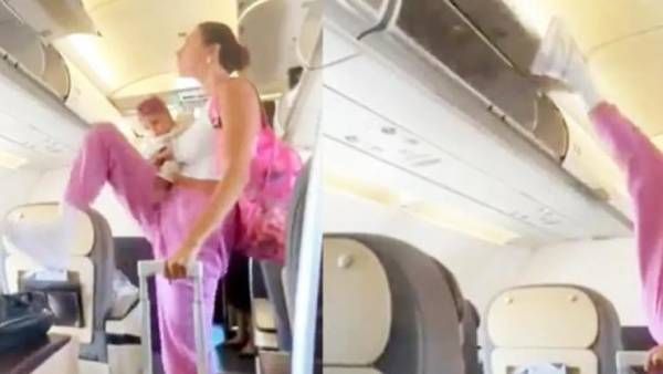 கவனிச்சீங்களா.. ஃபிளைட்டின் கேபின் கதவை டக்கென திறந்து.. இளம்பெண் செய்த காரியம்.. மிரண்ட பயணிகள்