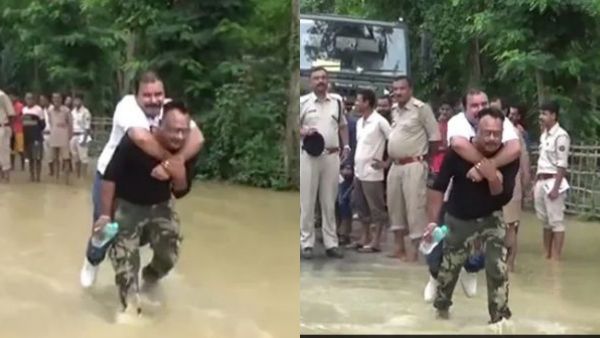 நான் தண்ணீல நடக்கமாட்டேன்! மீட்புபடை வீரரின் முதுகில் தொற்றிய பாஜக எம்எல்ஏ! அசாம் மழையில் சம்பவம்