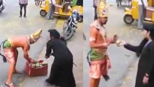 தலையில் சுமையுடன் கீழே விழுந்த இஸ்லாமிய பெண்! படாரென பாய்ந்து வந்த ஹனுமான்! தீயாய் பரவும் புகைப்படம்