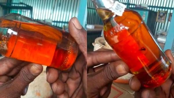 மதுபாட்டிலுக்குள் மட்டையான தவளை! சரக்கிற்குள்ளேயே சைட் டிஷ்ஷா? குமட்டிக் கொண்டு ஓடிய குடிகாரர்கள்.!