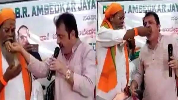 பேசிட்டு இருக்கும்போதே.. தலித் தலைவர் வாய்க்குள் இருந்த சாப்பாட்டை எடுத்து சாப்பிட்ட எம்எல்ஏ.. அடடா