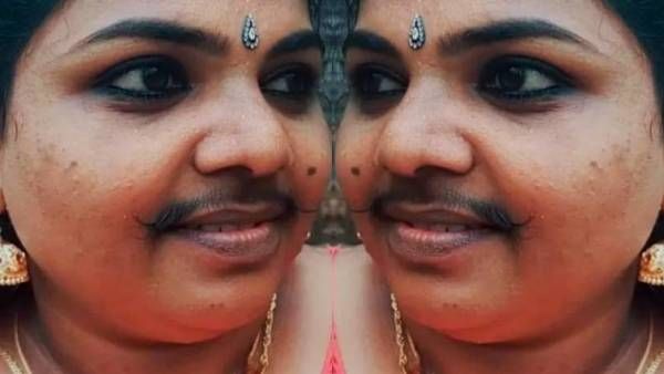 பிடிச்சிருக்கு, வச்சிருக்கேன்.. இத கிண்டல் பண்ண என்ன இருக்கு? கேரளாவில் பெண்ணுக்கு முறுக்கு மீசை