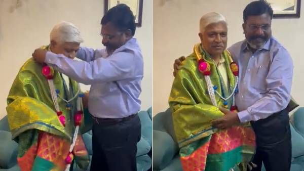 இந்து மதத்தை விட்டு 10,000 பேருடன் பவுத்தம் தழுவிய டெல்லி மாஜி அமைச்சர்- திருமாவளவன் நேரில் பாராட்டு