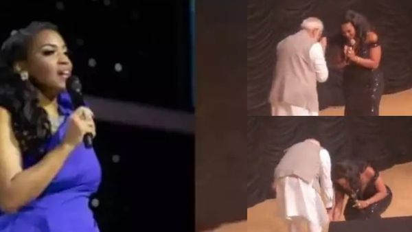 பிரபல பாடகி யார்னு தெரியுதா.. மோடியை பாத்ததுமே காலில் விழுந்து.. வல்லரசு நாட்டை திணறடித்த 