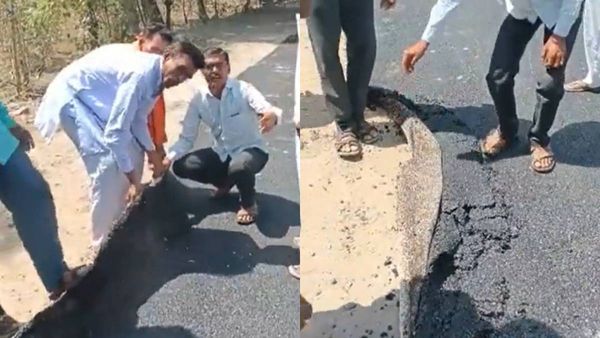 பாஜக கூட்டணி அரசின் மகாராஷ்டிராவில் தார்பாய் மாதிரி ரோட்டையே அலேக்காக தூக்கிய மக்கள்! இவ்ளோதான் தரம்