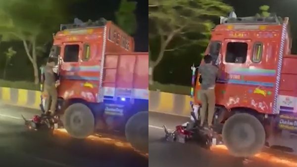 சாலையில் பறந்த தீப்பொறி.. பைக்கை 2 கிமீ இழுத்து சென்ற லாரி.. படியில் தொங்குவது யாரு பாருங்க