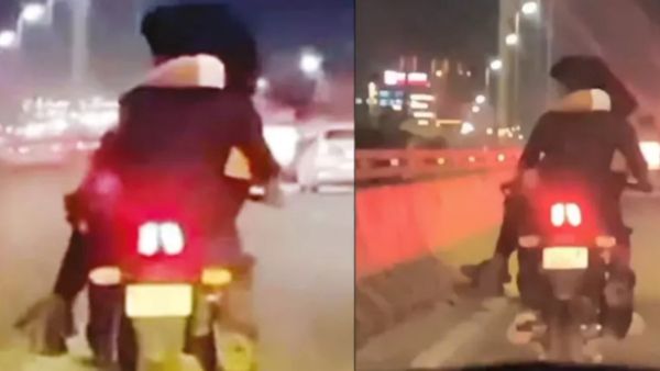 காதலியை மடி மீது உட்கார வைத்த இளைஞர்.. கரெக்ட்டா வந்த போலீஸ்! பெங்களூர் ஏர்போர்ட் ரோட்டில் பரபரப்பு