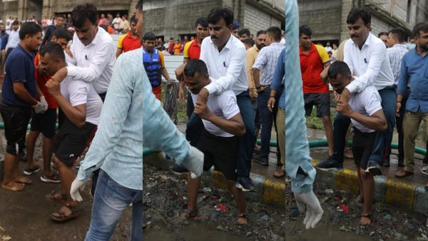 தீயணைப்பு வீரர் தோளில் உப்பு மூட்டை.. வாங்கிக் கட்டிக்கொண்ட சூரத் துணை மேயர்
