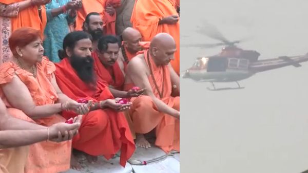 கும்பமேளா: 40 பேர் பலியான மரண ஓலத்துக்கு நடுவே ஹெலிகாப்டரில் பூமழை தூவி புனித நீராடிய 'சாது'க்கள்!