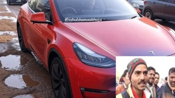 பல்லாங்குழி சாலை.. முட்டளவு தண்ணீரில் போகனும்.. டெஸ்லா கார் தாங்குமா? கலாய்த்த நெட்டிசன்கள்