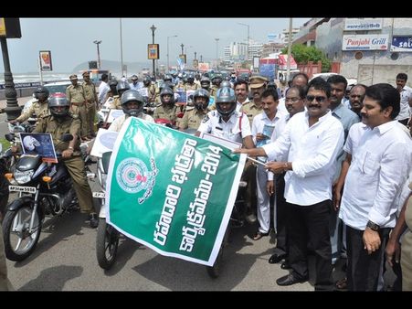 బైక్‌పై మంత్రి గంటా, క్షేమంగా వెళ్లి రావాలని.. (పిక్చర్స్)