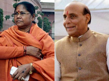 సభలో సాధ్వీ, క్యాబ్ డ్రైవర్ రేప్ దుమారం, రాజ్‌నాథ్ ఇంటి ముందు ధర్నా