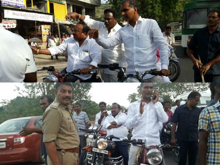 పుష్కరాలు: కారు తోసిన హరీశ్ రావు, ట్రాఫిక్ పోలీసుల్లా విధులు(పిక్చర్స్)