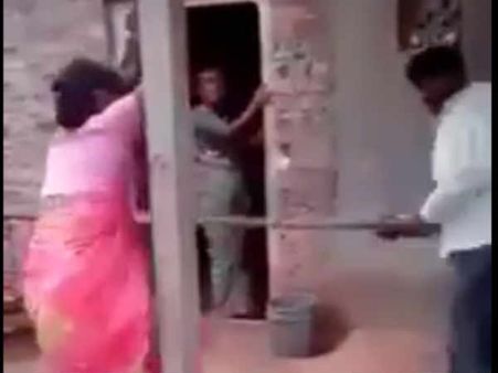 భార్యని, ప్రియుడ్ని కట్టేసి కొట్టిన భర్త వీడియో హల్‌చల్