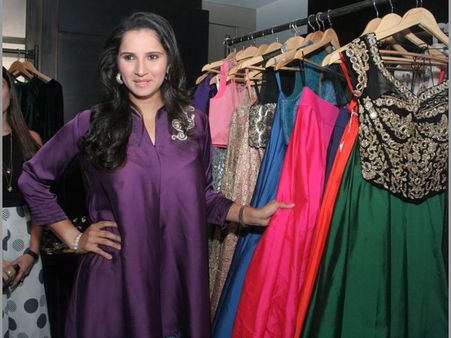 చిరునవ్వుతో సానియా 'షో' అదుర్స్ (ఫోటోలు)