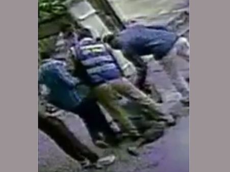 పక్కింటి వాచ్‌మెన్‌పై సీఐ కుమారుడి దాష్టీకం: సీసీ ఫుటేజీలో దొరికిన వైనం