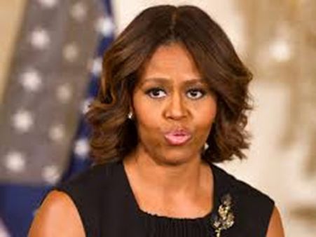 మిషెల్లీపై దారుణ జాత్యహంకారం: 'హై హీల్స్ కోతి' అంటూ దూషణ