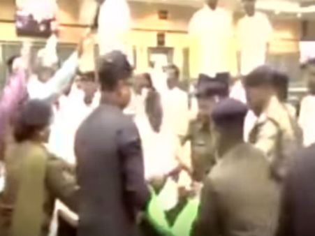 స్పీకర్ మీద షూలు విసిరిన ఎమ్మెల్యే (వీడియో)