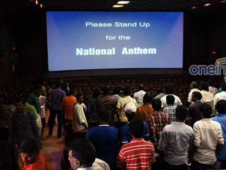 థియేటర్ లో జాతీయగీతం వస్తుంటే.. కూర్చునే ఉన్నారు.. అరెస్ట్ అయ్యారు