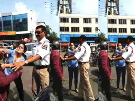 నడిరోడ్డుపై యువతి రచ్చ: బండబూతులతో విరుచుకుపడింది..