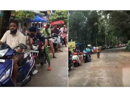 సహనానికి సలాం: పెట్రోల్ కోసం గంటల తరబడి ఓపిగ్గా క్యూలో నిల్చున్న మళయాళీలు